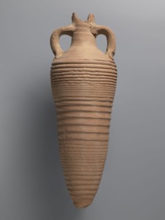 Amphora, unknown Egyptian workshop. Amphora with a spindle-shaped belly, fluted walls, and a