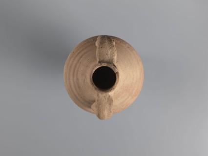 Amphora, unknown Egyptian workshop. Amphora with a spindle-shaped belly, fluted walls, and a