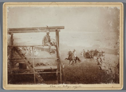Painting the Raclawice Panorama: Wojciech Kossak with a palette on scaffolding next to a part of