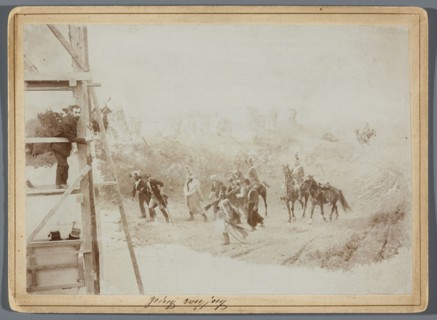 Painting the Raclawice Panorama: Teodor Axentowicz standing on scaffolding by a part of the canvas