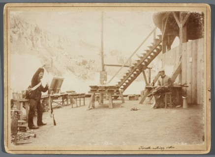 Wojciech Kossak sitting at the central platform of the rotunda and making a sketch for a painting