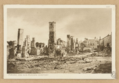 View of buildings destroyed by the Russians; postcard showing chimneys and war damage in a city