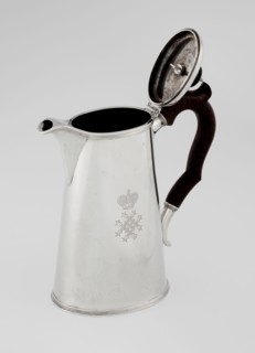 Conical coffee pot with hinged lid, slightly arched and flattened at the top, topped with a wooden