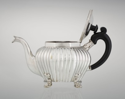 Teapot, maker Thomas II fl. 1798–1809?, goldsmith. Teapot supported on four legs in the form of
