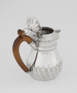 Coffee pot by John Septimus Beresford London goldsmith, active 1880–89. Pear-shaped jug, spirally