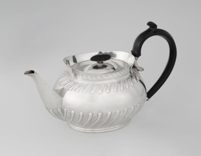 Teapot by Goldsmiths & Silversmiths Co Ltd London; makers William Gibson & John Langman goldsmiths.