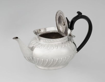 Teapot by Goldsmiths & Silversmiths Co Ltd London; makers William Gibson & John Langman goldsmiths.