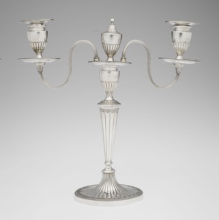 Two-candle candelabrum by Charles Hougham fl. 1769–1793. Two-armed candelabrum on an oval foot,