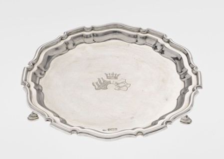 Tray on legs, goldsmiths Mappin & Webb Ltd maker, circular tray supported on three hoof-shaped