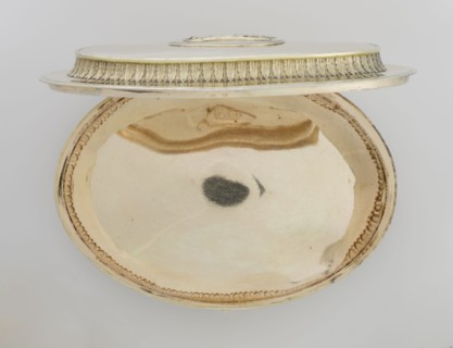 Oval toilet box by Thomas I Pitts fl. 1755–ca.1793, goldsmith. Oval box on four volute feet formed