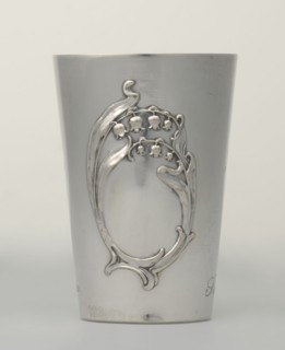 Art Nouveau conical mug by Jezler & Co Schaffhausen; silversmith; established 1822. Relief ornament