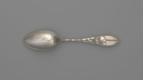 Souvenir spoon by Towle Silversmith fl. 1882–, late 19th century. Ovoid dipper with pointed tip