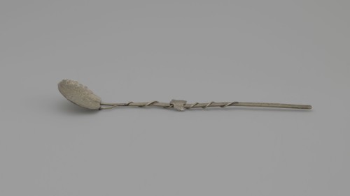Decorative spoon, decorative spoon with a flat round scoop with irregular edges decorated on both