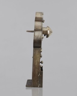 Four-bolt door lock with key missing. 17th century. Baroque style; metalwork. Rectangular plate