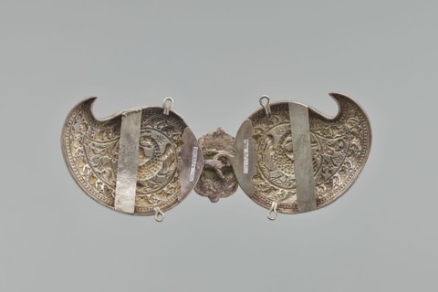 Buckle, Repossession; gift. Silver buckle fastening Delya's coat, probably royal, inscription 24