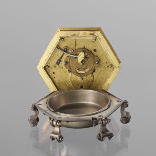Tiled clock by Michael Gugenmus 1705–1775, maker/watchmaker. Rococo style with Regency ornament,