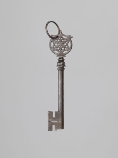 Key, locksmithing, rosette ornament. A key of the so-called Venetian type with a smooth tubular