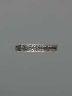 Bracelet; maker, scrap metal; Chinese/Mongolian decorative style; dragons including dragon with