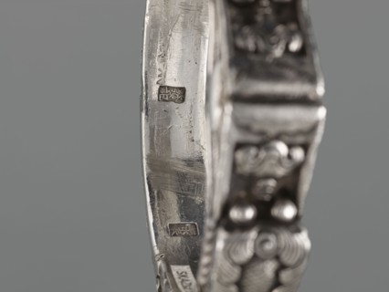 Bracelet, scrap metal, purchased; Chinese and Mongolian art influences; body/hand ornament, fashion