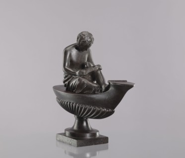 Decorative cast iron oil lamp, cast by Szewczykowski, Roman 1849–1901. 19th century, Poland. Square