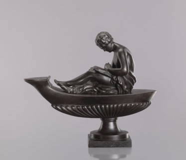 Decorative cast-iron oil lamp, attributed to Szewczykowski, Roman 1849–1901. Square plinth