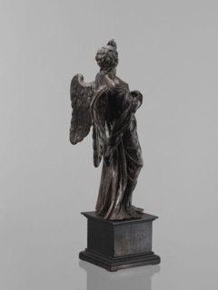 Statue - Angel, Renaissance, 16th century. Figure of a standing angel with his left hand raised,