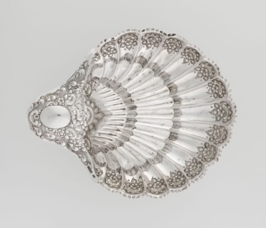 Shell-shaped silver platter by Atkin Brothers Silversmith Ltd Sheffield; goldsmith and silversmith