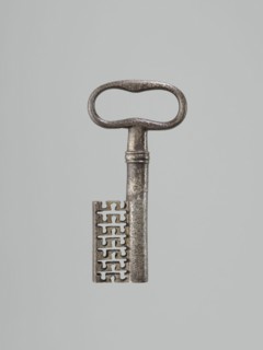 Lock key, locksmithing. One-sided register with a key pin; octagonal plates; bottom side extensions