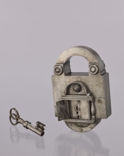 Rectangular padlock with a bow, 19th century, Polesie; locksmithing; height 18.3 cm, width 11.7 cm,