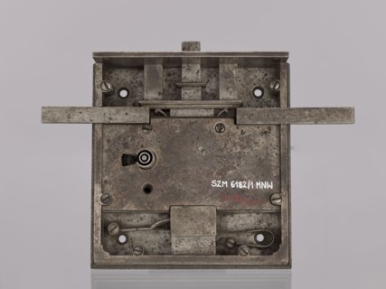 Square-faced door lock with latches and key. Maker: Michal Taszynski fl. 1820–1838. Made 1861 for
