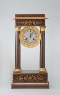 Mantel clock by Alexandre Pertrand fl. ca. 1840. Four-column portico form on cuboid base and
