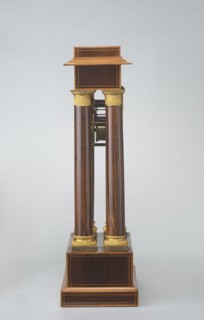 Mantel clock by Alexandre Pertrand fl. ca. 1840. Mantel clock in the form of a four-column portico