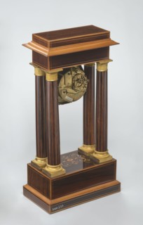 Mantel clock by Alexandre Pertrand fl. ca. 1840. Mantel clock in the form of a four-column portico