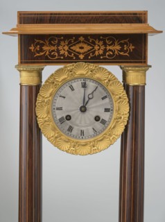 Mantel clock by Alexandre Pertrand fl. ca. 1840. Four-column portico form on a cuboid base and