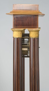 Mantel clock by Alexandre Pertrand fl. ca. 1840. Mantel clock in the form of a four-column portico