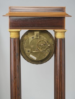 Mantel clock by Alexandre Pertrand fl. ca. 1840. Mantel clock in the form of a four-column portico