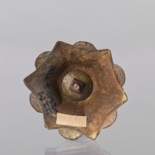 Candlestick, enamel, on a hexagonal base tapering towards the top with a shaft; on each side a coat