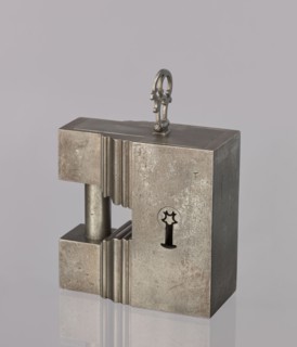 Padlock, 19th century. A padlock in the shape of a cuboid, the upper part topped with a kind of