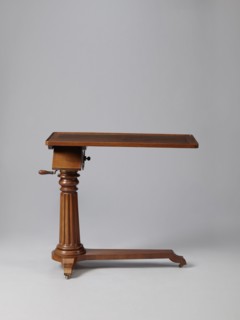 Bedside table, Biedermeier style, mahogany. Composed of an elongated platform outline similar to a