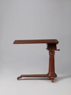 Bedside table, Biedermeier style, mahogany, composed of an elongated platform outline similar to a
