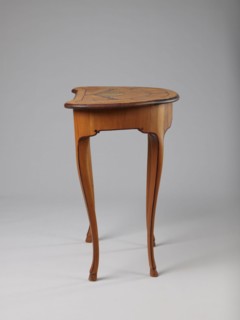 Table, Gift. Pre-war. Kidney-shaped auxiliary table supported by four slender, slightly curved