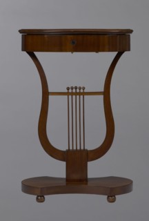 Oval display table with lyre-shaped base mounted on a platform with a concave-convex outline,