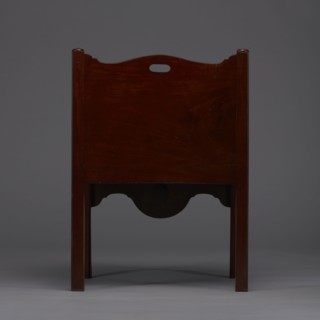 Bedside table with toilet, tambour door in the upper section and a pull-out section below with a