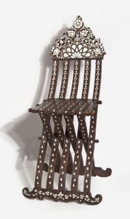 Chair with footrest, seat, and backrest composed of five slatted elements, richly inlaid with bone