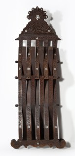 Chair, rosettes and geometric ornament, Kufi script. Scissor chair with footrest, seat, and