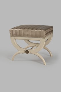 Stool, origin unknown, Empire style. Rectangular stool with a black painted frame, upholstered,
