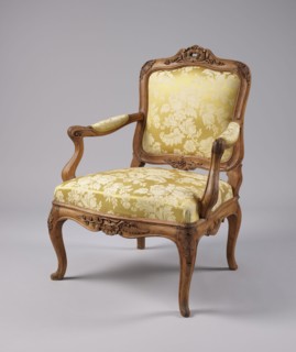 Armchair, rococo style, carved and upholstered seat, backrest and armrests, on four cabriole legs