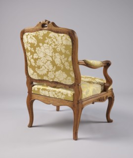 Armchair, rococo style, carved and upholstered seat, backrest and armrests, on four cabriole legs