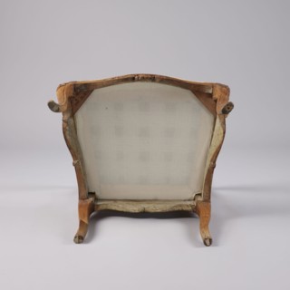 Armchair, rococo style, carved and upholstered seat, backrest and armrests, on four cabriole legs