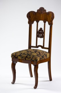 Chair, mahogany chair with a padded seat and a high openwork backrest, with carved decoration.
